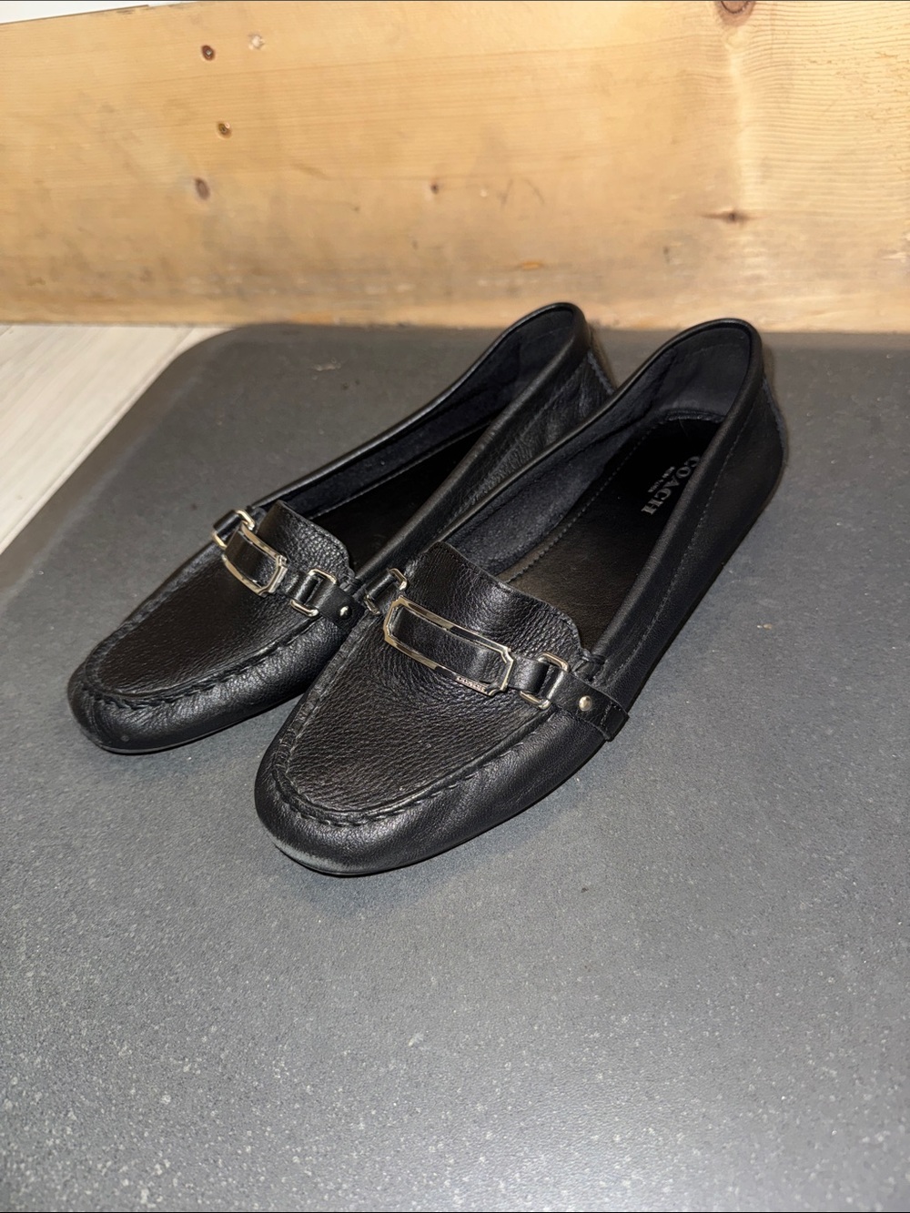 Coach Black Leather Slip-On Loafers with Silver Buckle